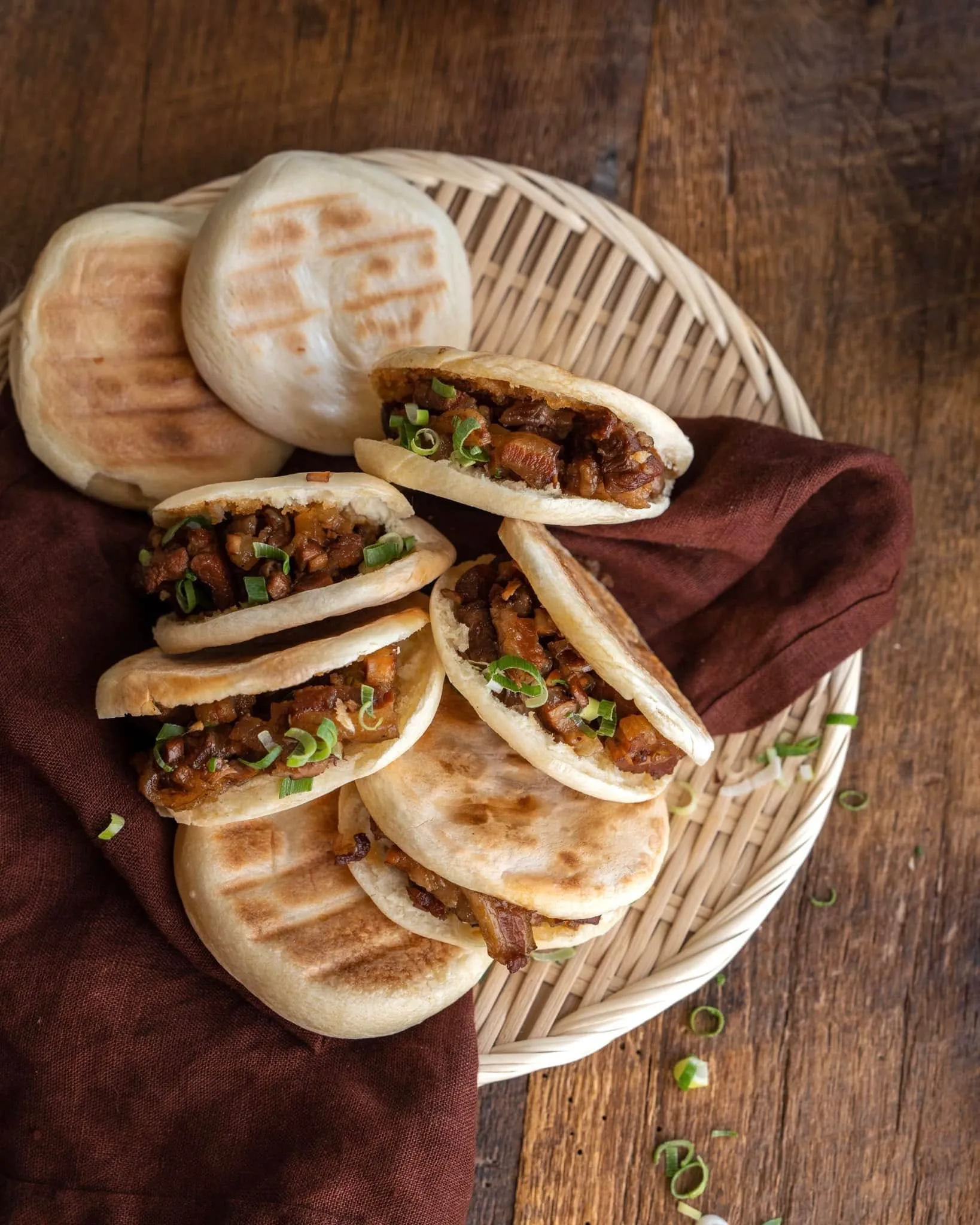 Dumplings, bao and the kitchen behind them, shot for the menu and for Instagram. Shot for Laotse.